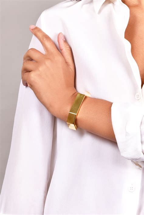 celine gold geometric cuff|Celine.